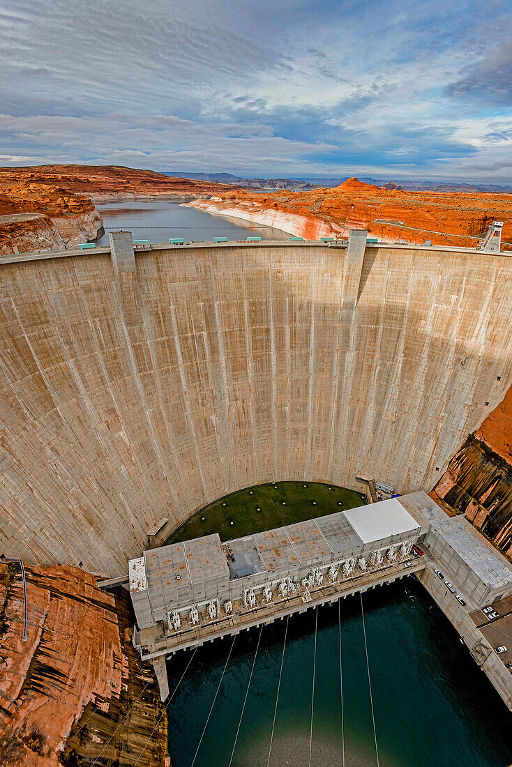Glen Canyon Dam is a concrete arch dam on the Colorado River in northern Arizona, USA.