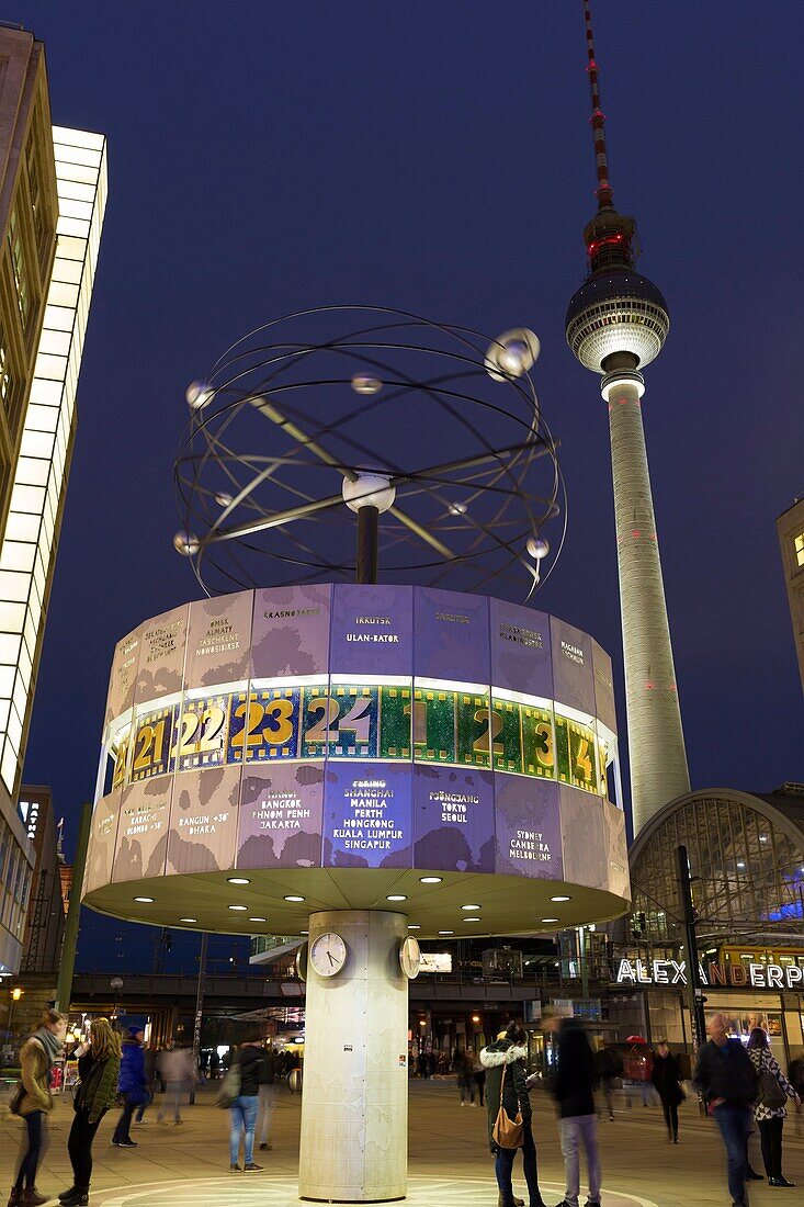 World clock and television tower at night, Alexanderplatz, Berlin, Germany.