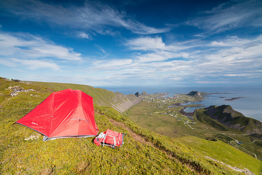 Tent on mountain ridge overlooking meadows and sea, Sorland, Vaeroy Island, Nordland county, Lofoten archipelago, Norway, Scandinavia, Europe