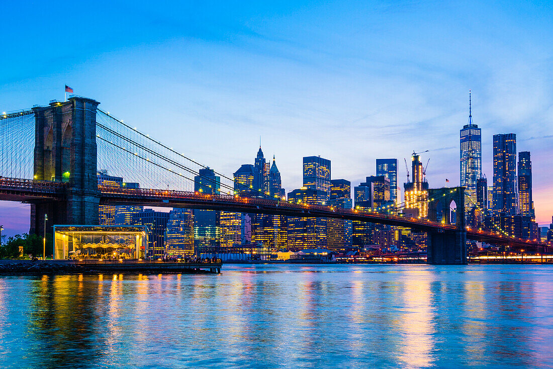 Brooklyn Bridge and Manhattan skyline at dusk, New York City, United States of America, North America