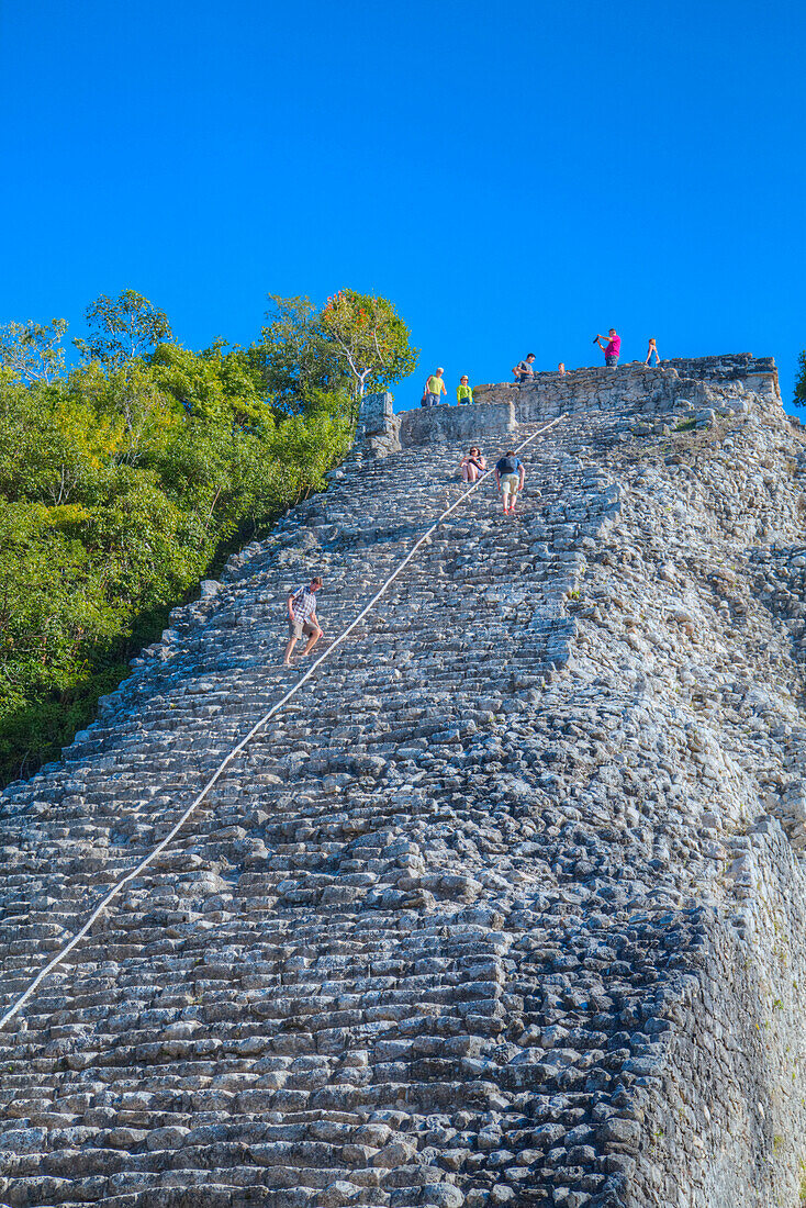Tourists climbing the Temple, Nohoch Mul Temple, Coba, Quintana Roo, Mexico, North America