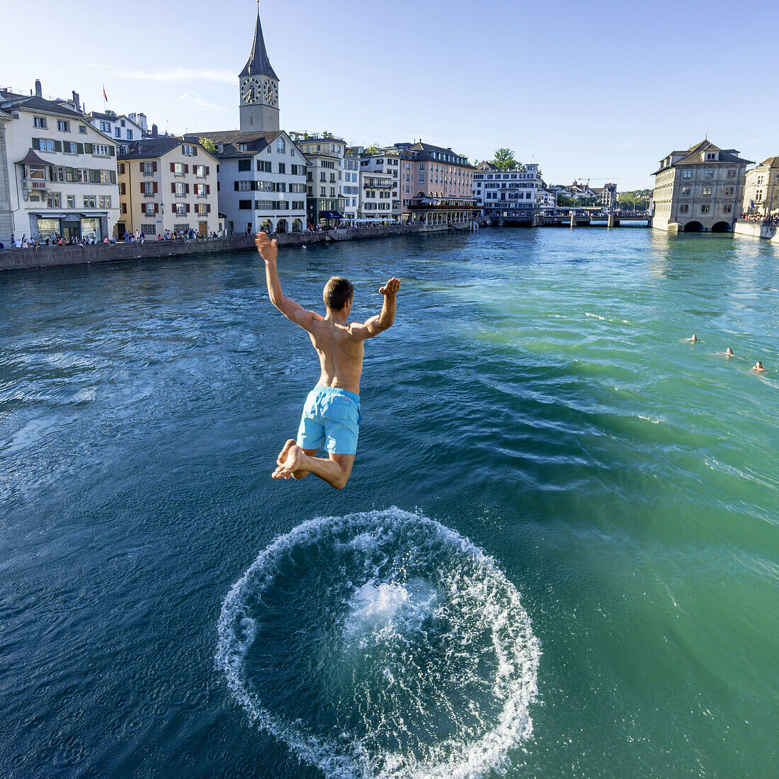 Man jumping into River Limmat, Zurich, Switzerland
