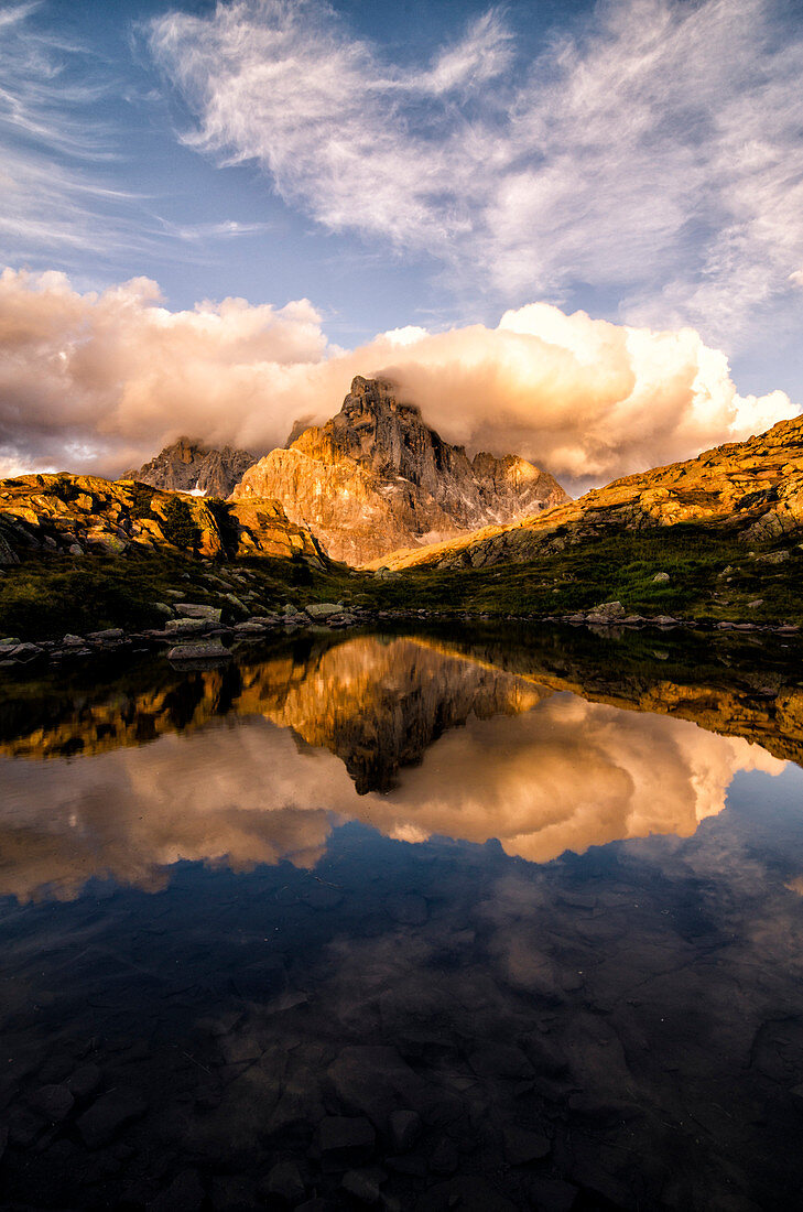 Dolomites, Cimon della Pala, most famous peak of the Pale di San Martins group , reflected on one of Cavallazza Lakes