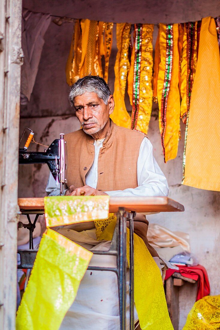 Asia, India, Uttar Pradesh, Nandgaon, tailor in the village streets