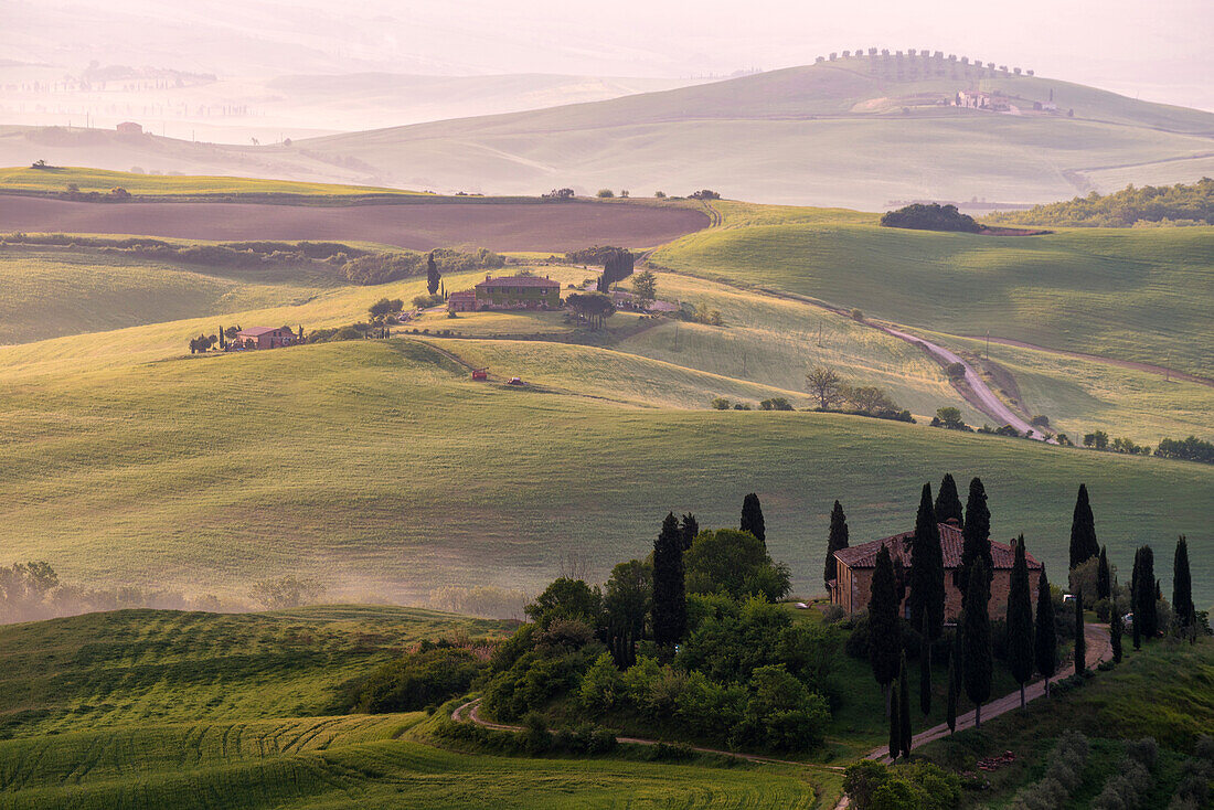 Europe, Italy, Podere Belvedere sunrise in Tuscany, province of Siena, Orcia Valley