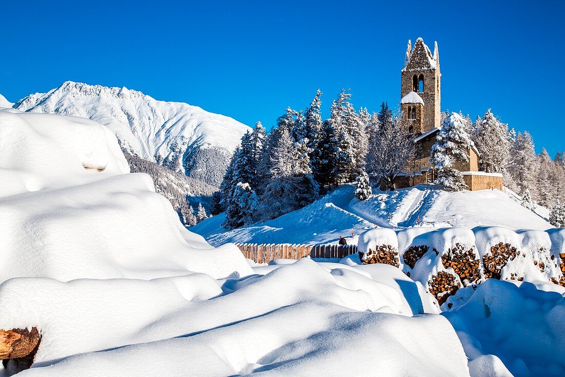 The church of San Gian in winter, Celerina, Engadine, Canton of Grisons Switzerland Europe