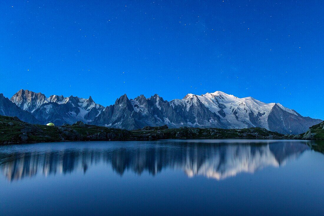 The Mont Blanc mountain range reflected in the waters of Lac de Chesery, Haute Savoie France