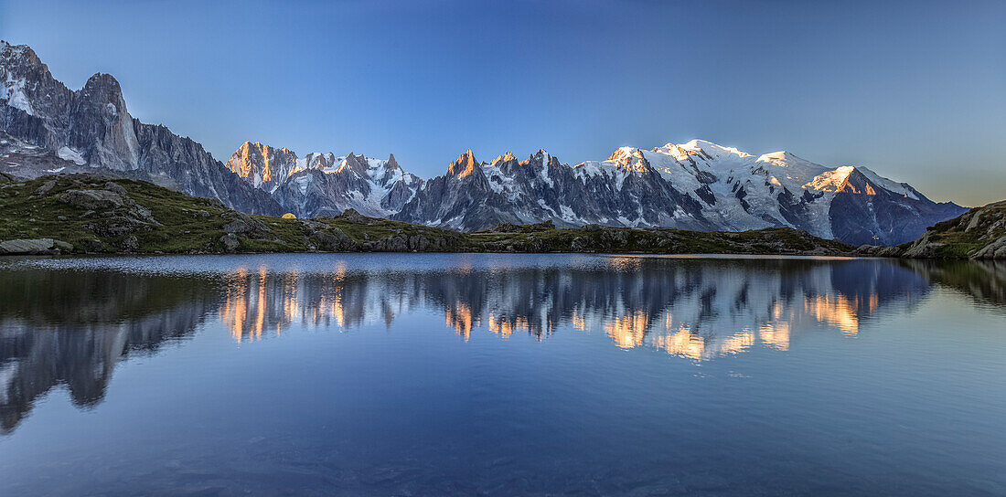 Sunrise over Lac de Cheserys, In the background the range of Mont Blanc, Haute Savoie, France