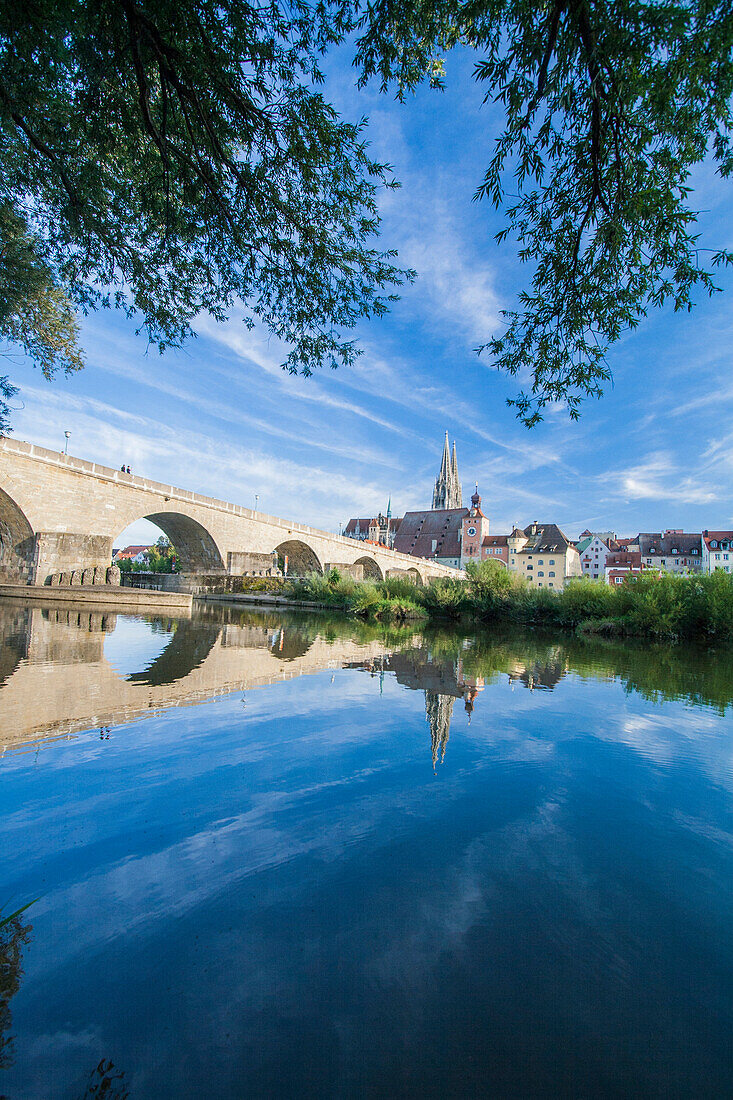 Stone bridge over Danube River Regensburg Bavaria Southern Germany Europe