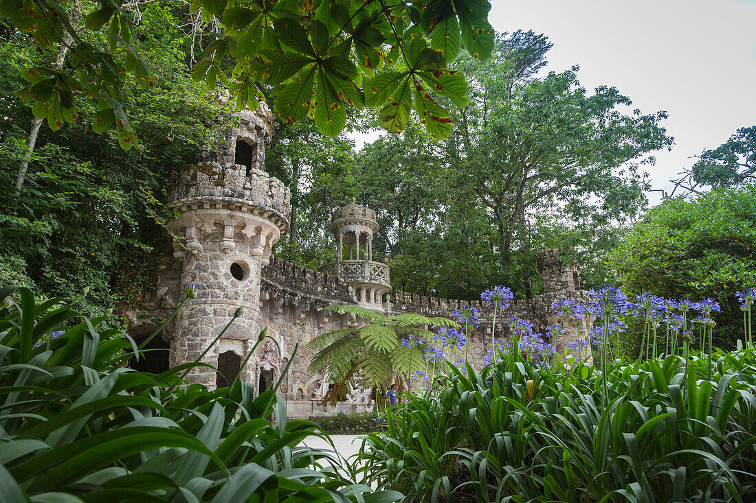 Mystical constructions of Romanesque Gothic and Renaissance style inside the park Quinta da Regaleira Sintra Portugal Europe
