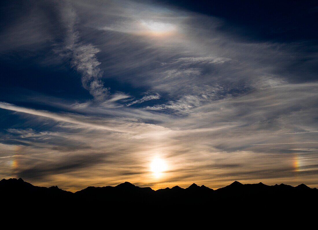 A 22-¦ halo at the sunset in Valgerola, Valtellina, Italy, Alps