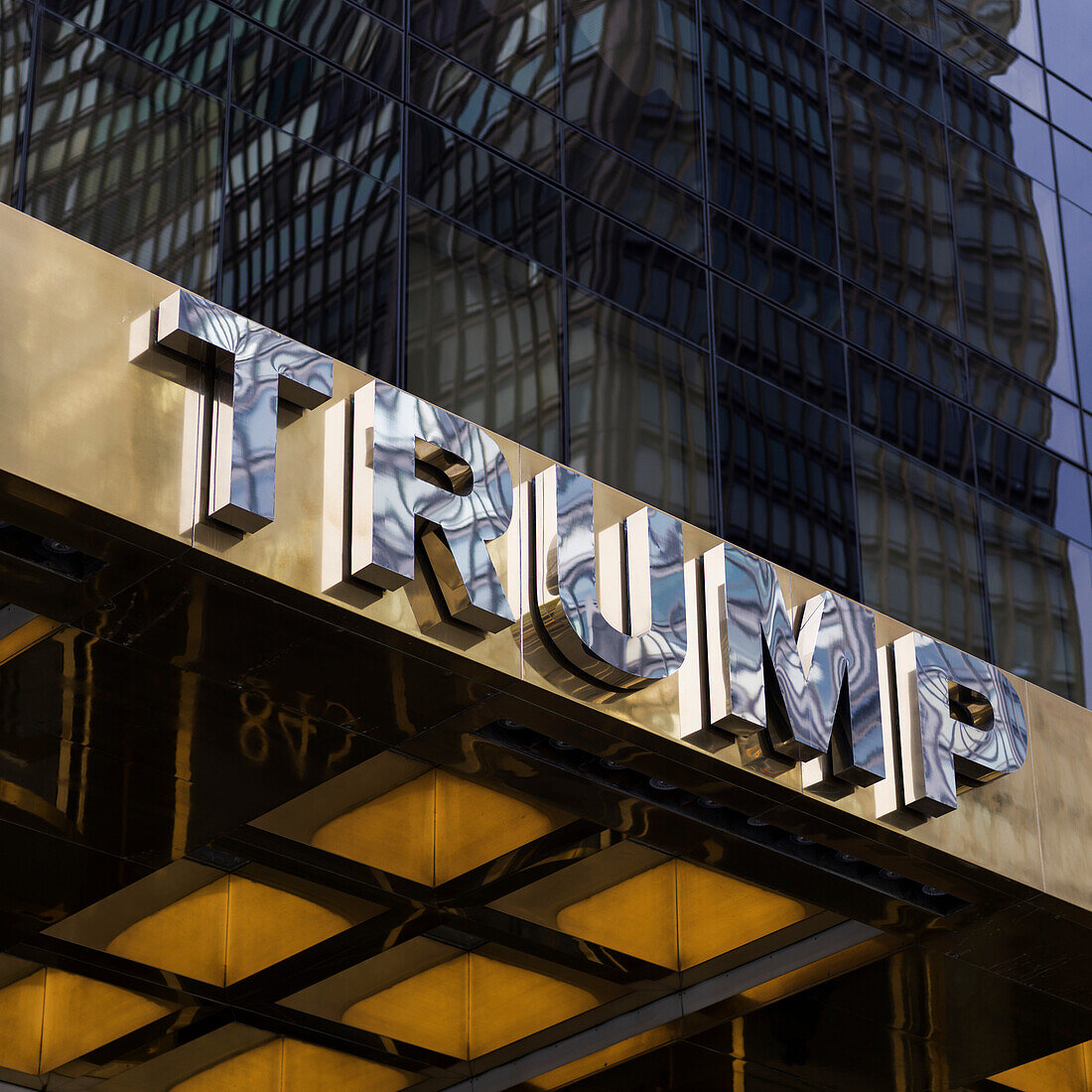 'Sign at the bottom of Trump Tower; New York City, New York, United States of America'