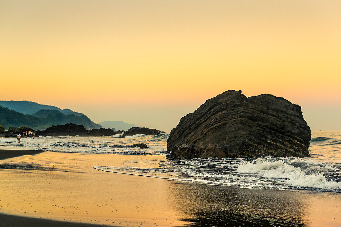 'Golden sunset over Waiao beach in Yilan Country, beautiful volcanic landscape; Taiwan, China'