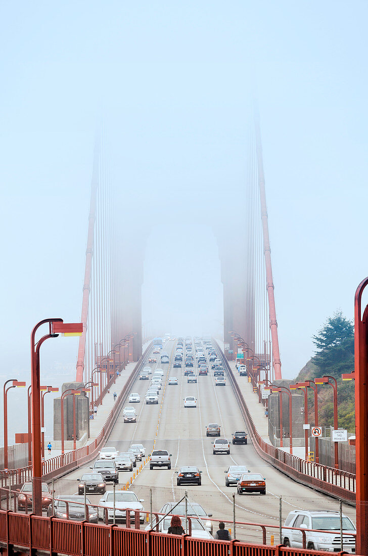 'The Golden Gate Bridge in the fog; San Francisco, California, United States of America'