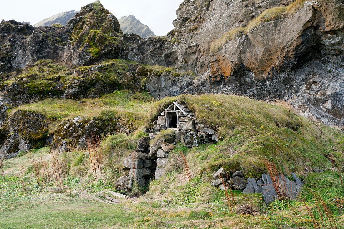 Traditional turf-roofed house at Drangshlid, near Skogar, Iceland, Polar Regions