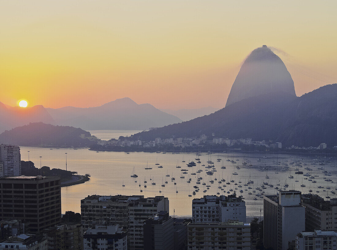 View over Botafogo Neighbourhood towards the Sugarloaf Mountain at sunrise, Rio de Janeiro, Brazil, South America