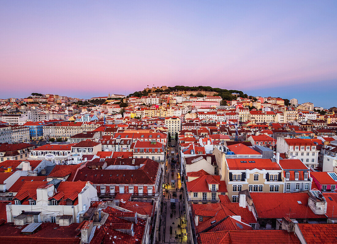 Miradouro de Santa Justa, view over downtown and Santa Justa Street towards the castle hill at sunset, Lisbon, Portugal, Europe