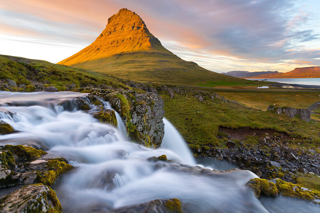 Kirkjufell Mountain and Kirkjufoss Waterfall at sunset, Snaefellsnes Peninsula, Iceland, Polar Regions