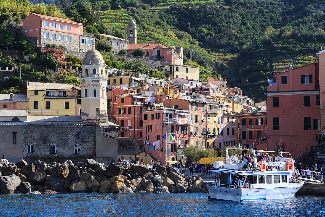 Colourful village houses, churches and ferry, Vernazza, Cinque Terre, UNESCO World Heritage Site, Ligurian Riviera, Liguria, Italy, Europe