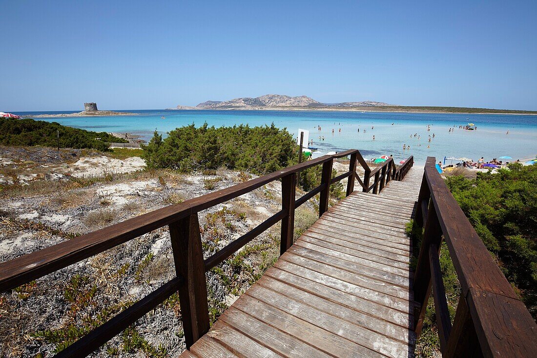 Footbridge to the beach of La Pelosa in Stintino, Sardinia, Italy.
