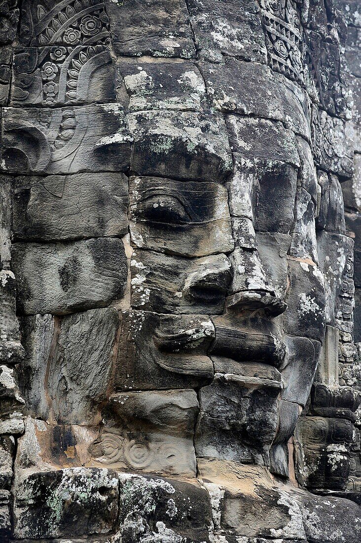 Carved stone head at Bayon temple,Angkor Wat,Cambodia,Indochina,Southeast Asia,Asia.