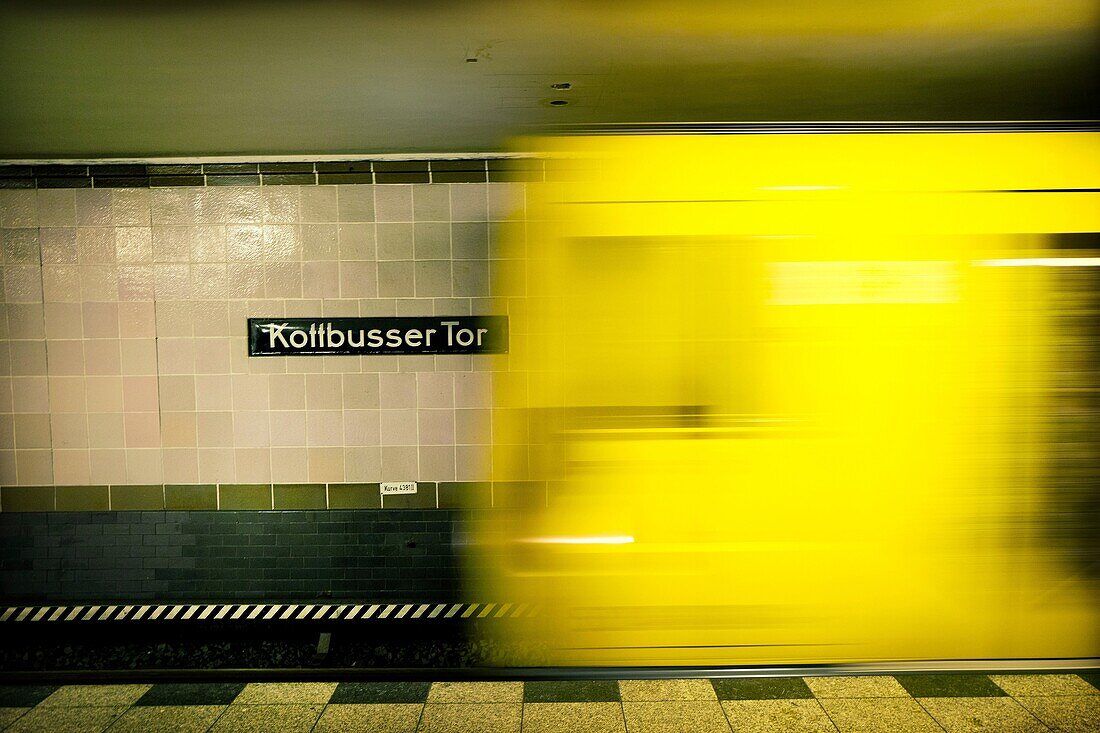 Moving train in Kottbusser Tor subway station. Berlin, Germany
