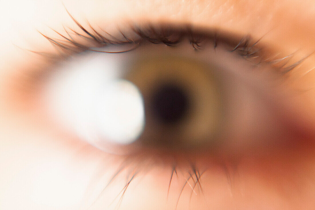 Defocused image of woman's eye