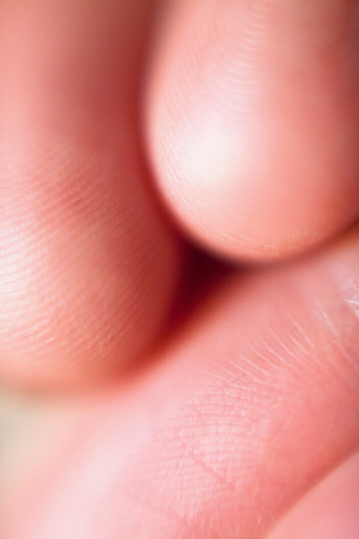 Extreme close-up of woman's fingers