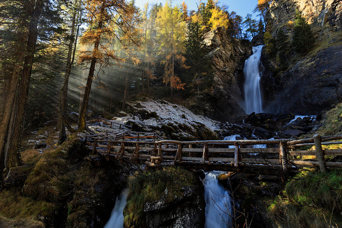Saent waterfalls in Val di Rabbi in autumn, province of Trento, Trentino Alto Adige, Italy