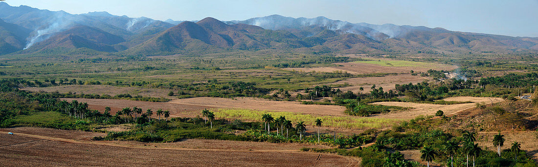 Caribbean, Cuba, Sancti Spiritus, Trinidad, San Luis valley, stubble-burning in the Sierra del Escambray, panoramic view