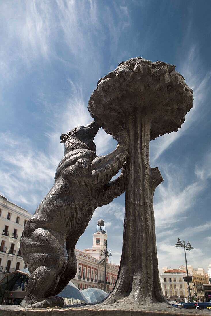 Spain, Madrid, Sun Gate Square (Puerta del Sol), The Bear and the Strawberry Tree sculpture, symbol of Madrid
