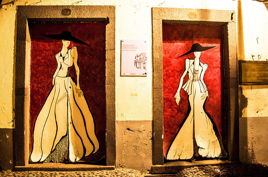 Madeira Island: Portao Sao Thiago Street, two women painted on two doors