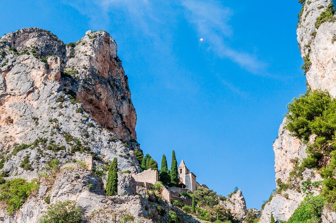 France, Provence, near Gorges du Verdon, Moustier-Sainte-Marie, medieval church located in the mountain top