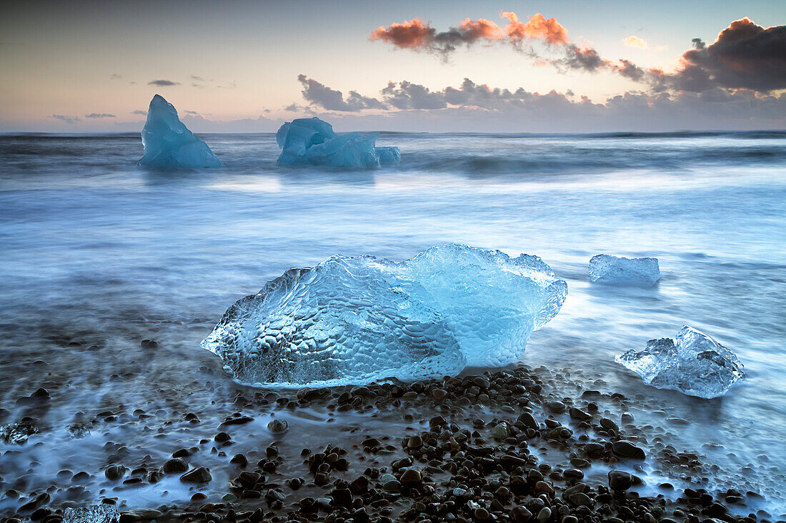 Block of ice on the black beach in Jokulsarlon Glacier Lagoon, Eastern Iceland, Europe