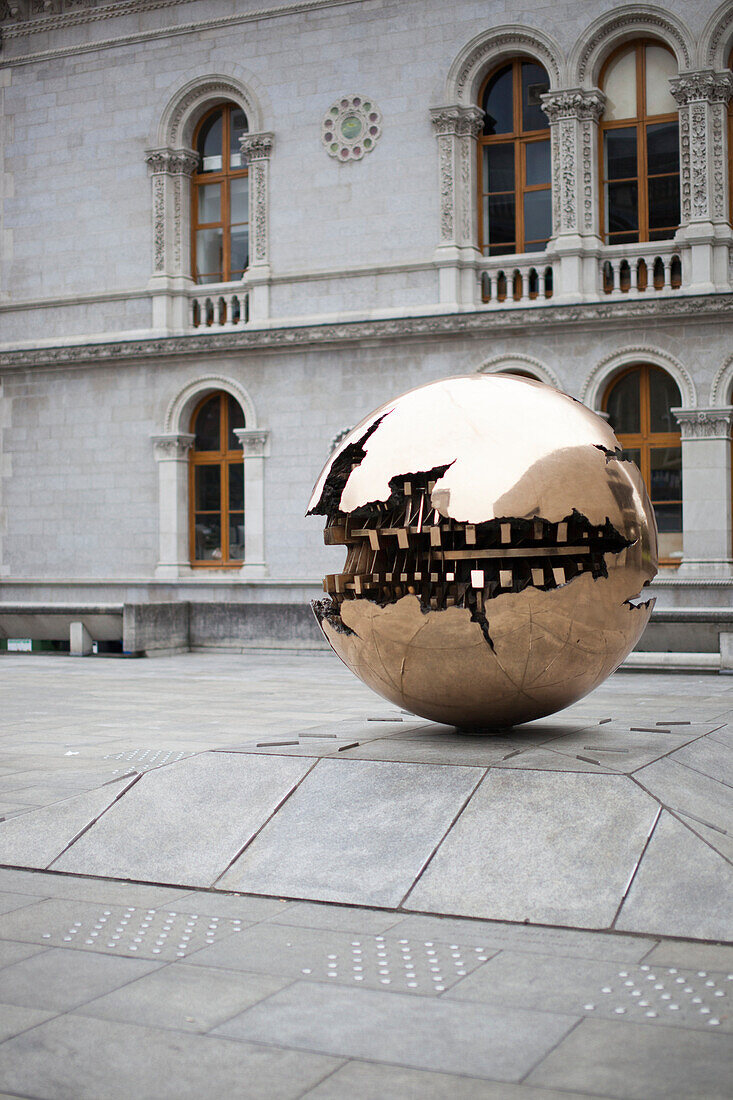 Arnaldo Pomodoro's 'Sphere within sphere' at the Berkeley Library, Trinity College, Dublin, Leinster, Ireland, Europe