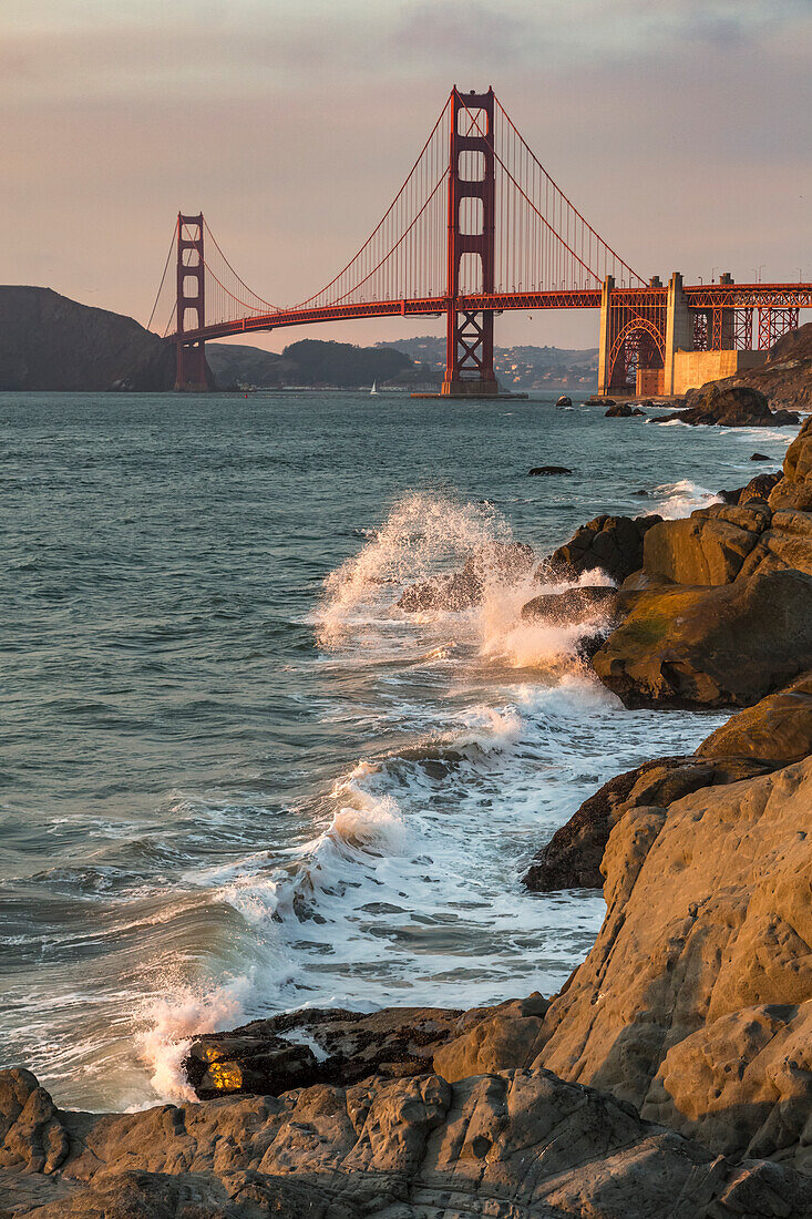 Golden Gate Bridge at sunset shot from Baker Beach, San Francisco, Marin County, California, USA