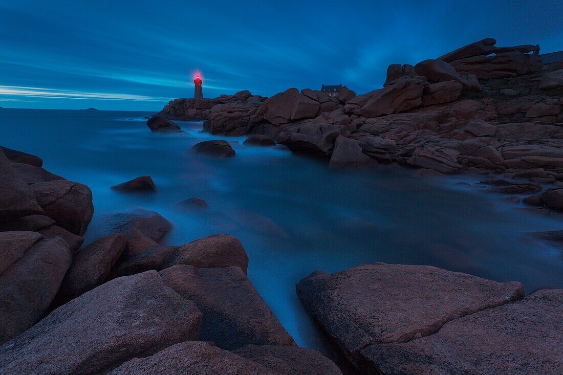 Mean Ruz lighthouse, Brittany, France, The Ploumanach's lighthouse one hour after sunset during the rising tide