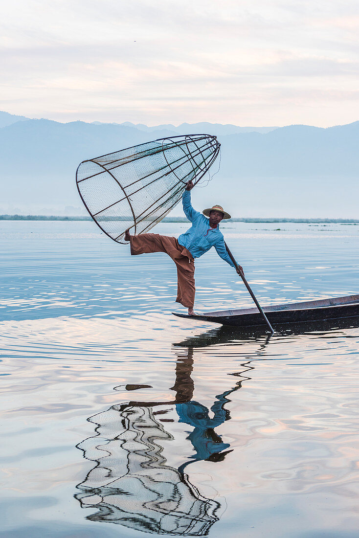 Inle lake, Nyaungshwe township, Taunggyi district, Myanmar Burma , Local fisherman with typical conic fishing net