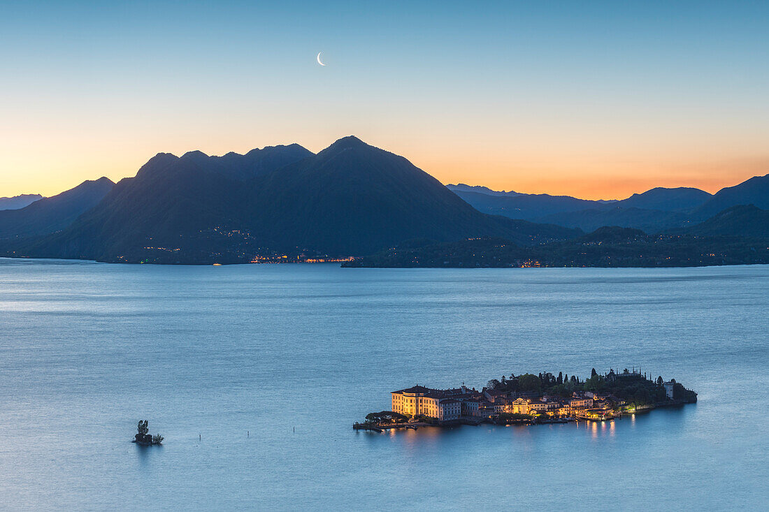 Borromean Islands, Stresa, Lake Maggiore, Verbano-Cusio-Ossola, Piedmont, Italy, Isola Bella at dawn with moon