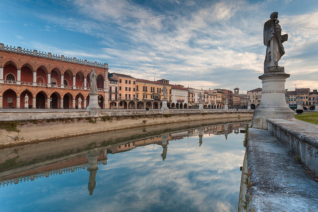 Europe, Italy, Veneto, Padua, Buildings reflected in the canal around Prato della Valle