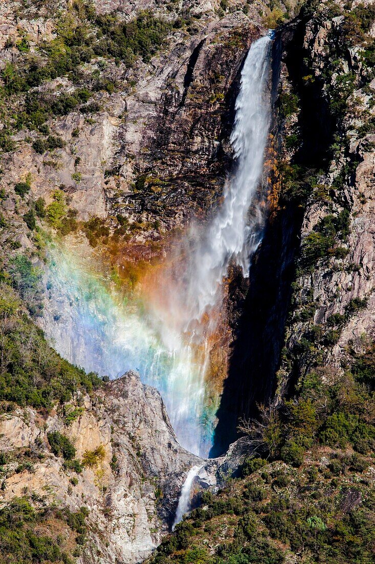 Rainbow in the waterfall at Chiavenna valley, Lombardy, Italy