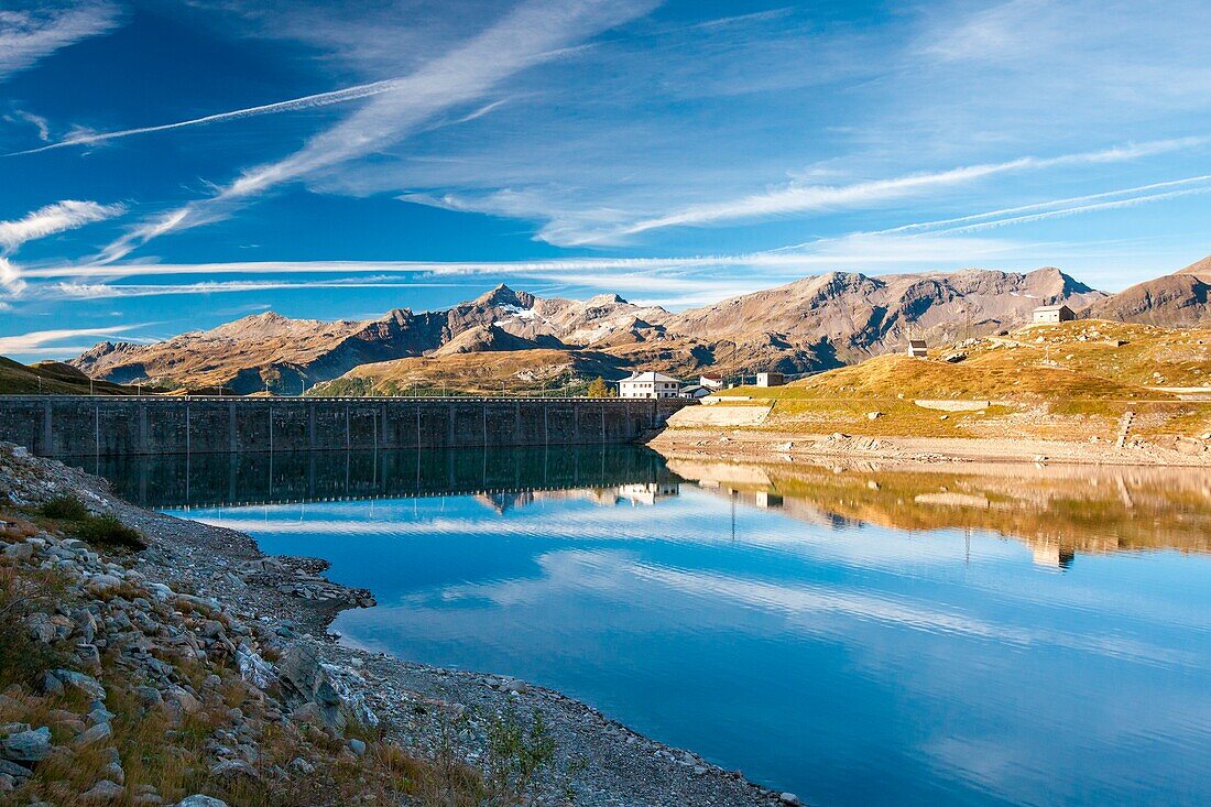 Clouds reflected in the Montespluga dam, Valchiavenna, Valtellina Lombardy Italy Europe