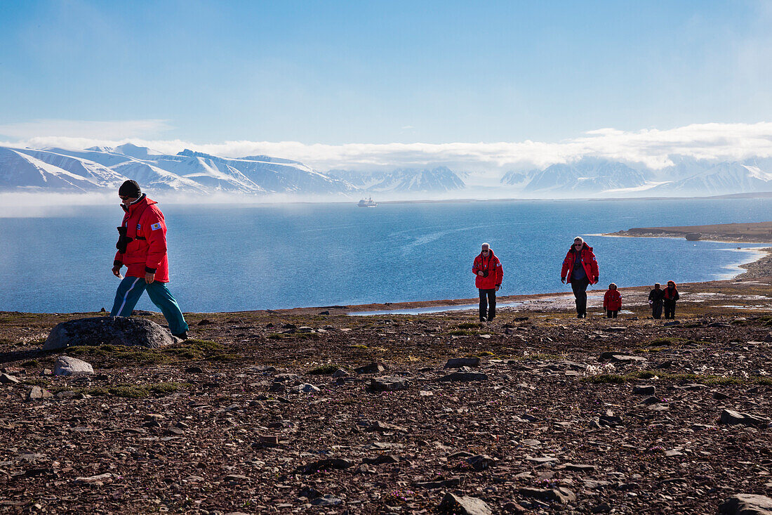 People hiking at Worsleyhamna, Liefdefjorden Spitzbergen, Svalbard