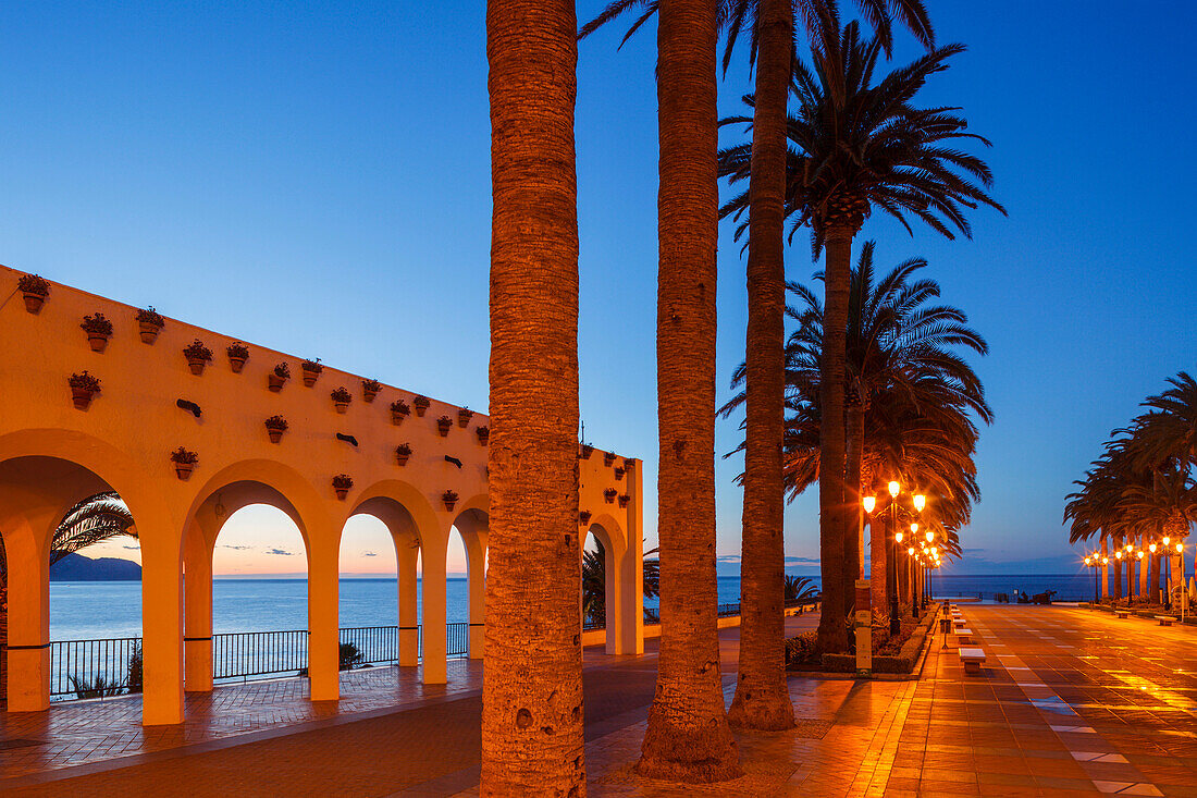 arcades and palm trees at night, Balcon de Europa, viewpoint to the Mediterranean Sea, Nerja, Costa del Sol, Malaga province, Andalucia, Spain, Europe