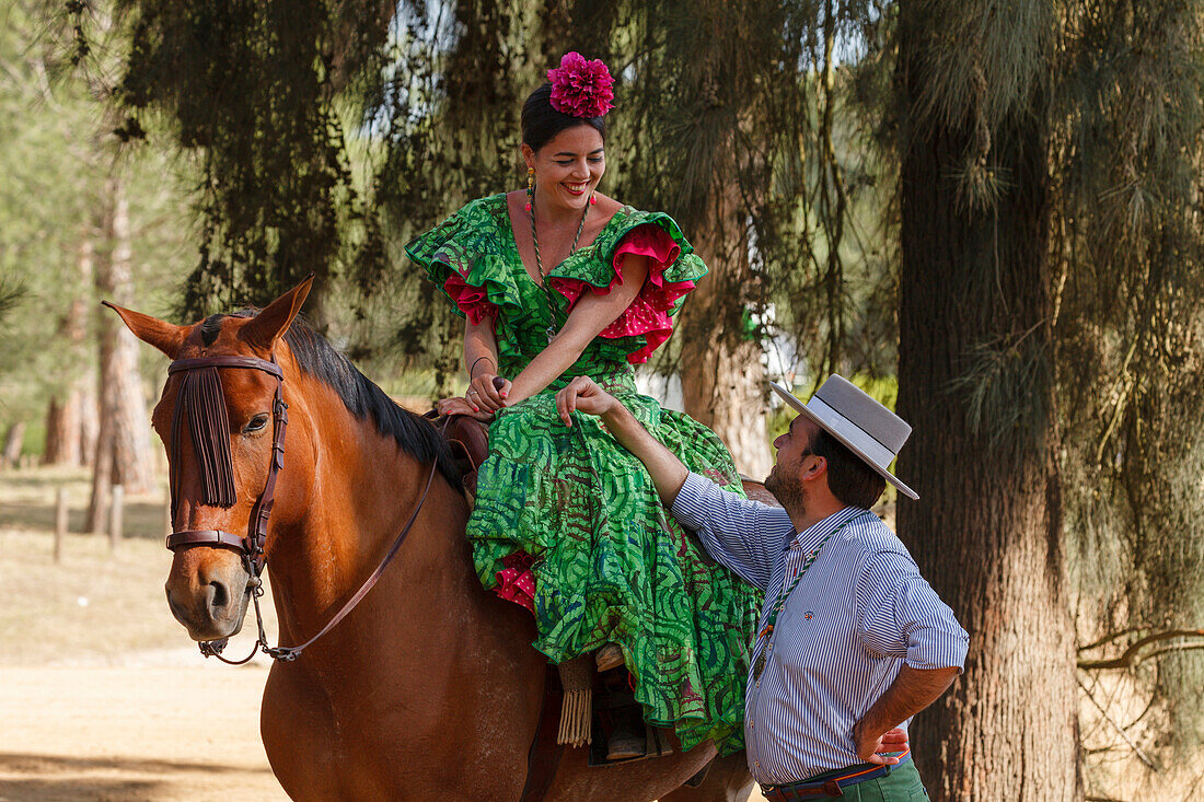 Horse rider, woman, El Rocio pilgrimage, Pentecost festivity, Huelva province, Sevilla province, Andalucia, Spain, Europe