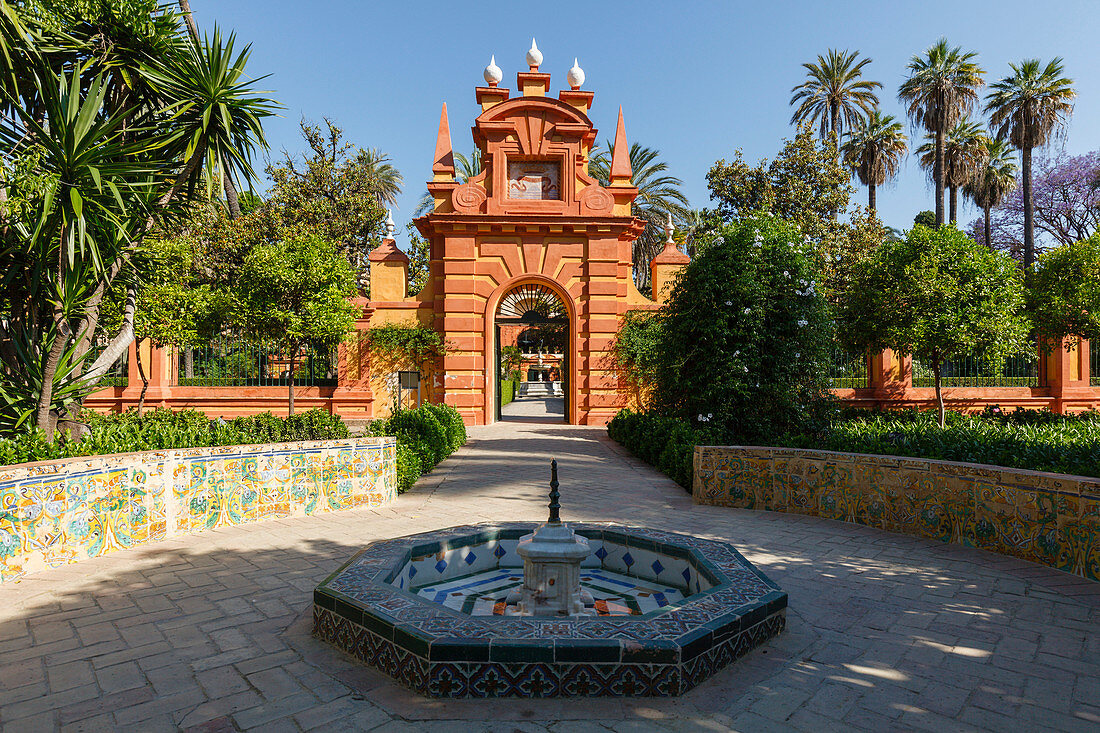 Gateway with palm trees, Jardin Marques de la Vega Inclan, Jardines del Real Alcazar, garden of the royal palace, UNESCO World Heritage, Sevilla, Andalucia, Spain, Europe