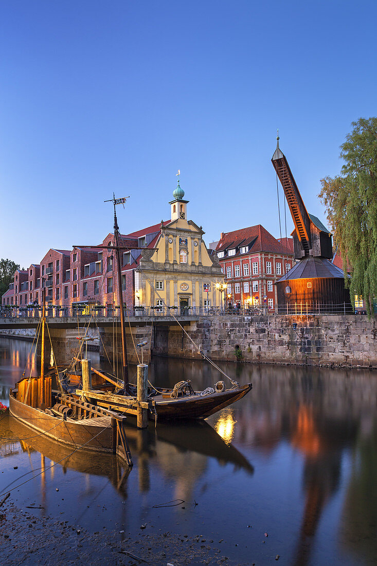 Sailing ships, crane and houses by the old harbour in the Hanseatic town Lüneburg, Lower Saxony, Northern Germany, Germany, Europe