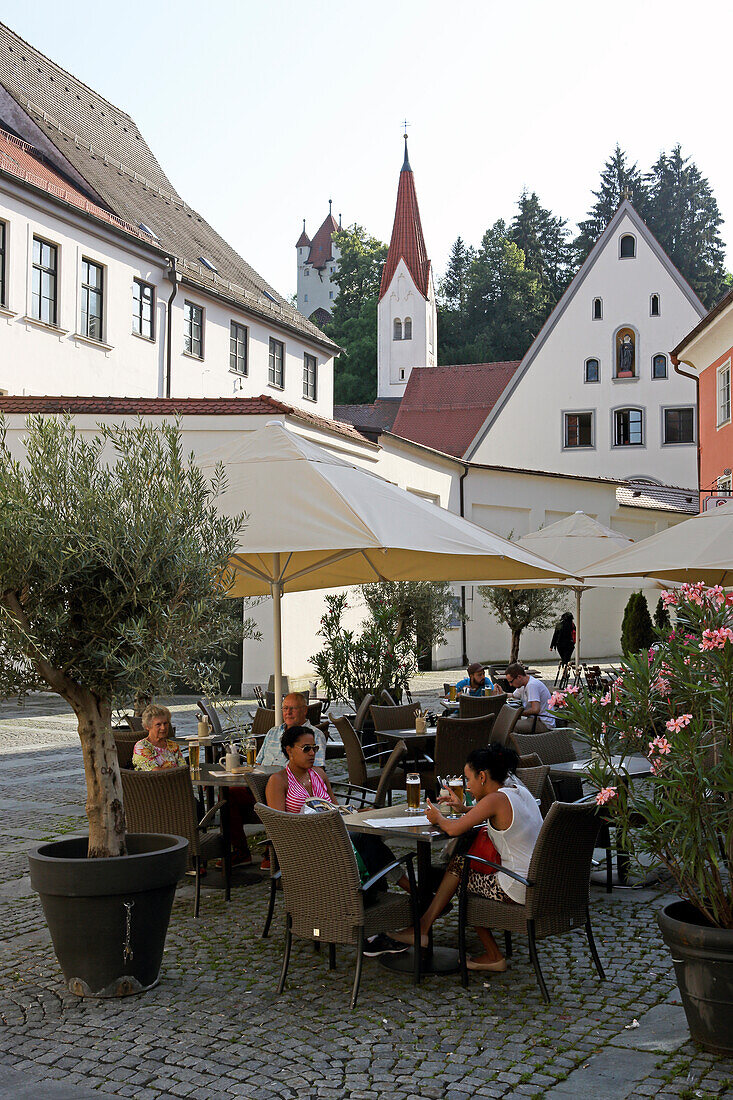 Obstmarkt and the terrace of Restaurant Rose, View at Franciscan women monastery, Eastern Allgaeu, Swabia, Bavaria, Germany