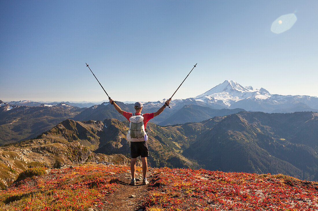 Backpacker Exploring Mount Baker While Hiking In North Cascades National Park