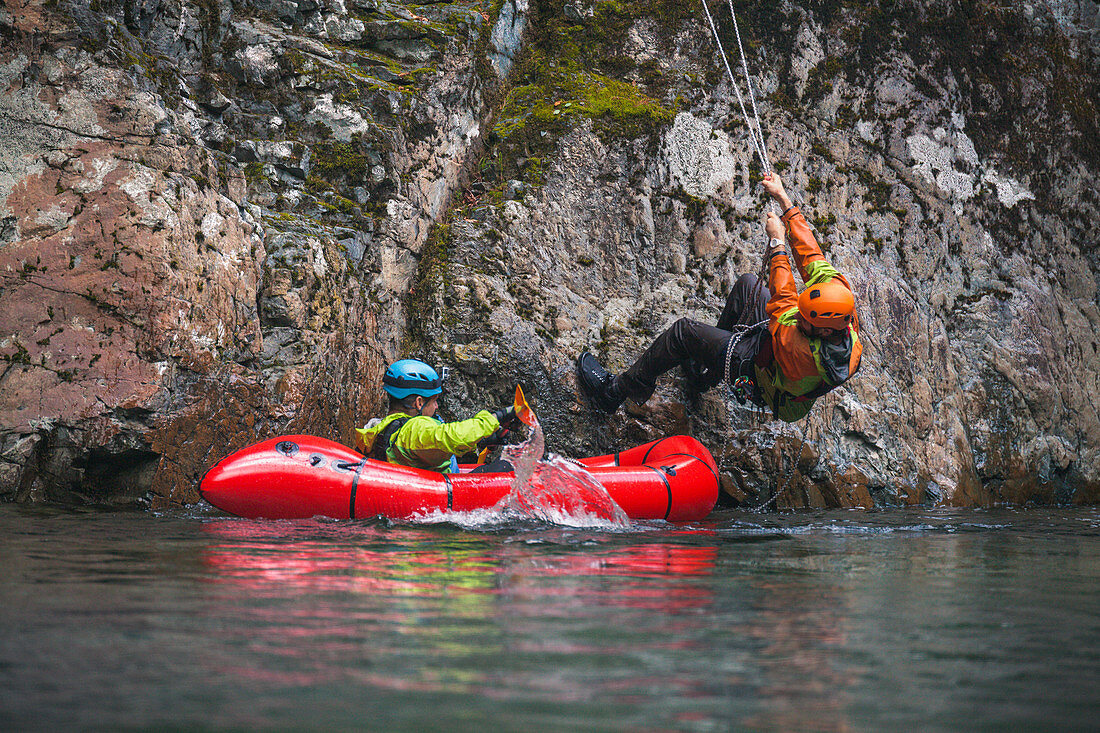 Evan Howard Rappels Off A Cliff Towards The Chehalis River And Into A Packraft